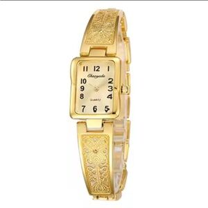 Classic Women's Gold Watch with Intricate Design